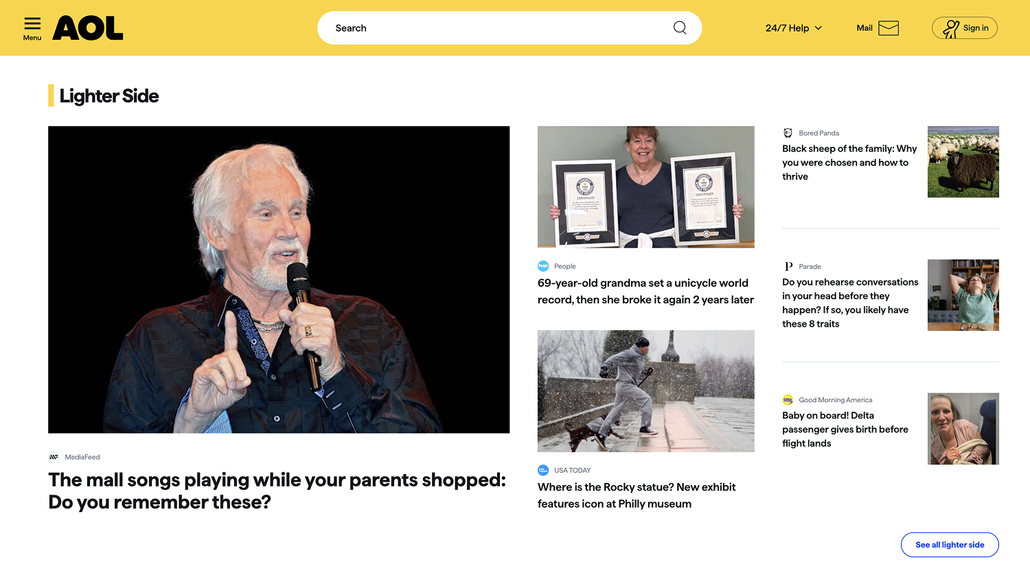 Screenshot of the AOL.com homepage showing top news headlines, trending stories, and navigation tabs